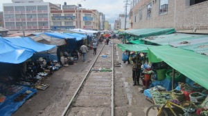As the train left Puno, the railway track runs through the town and the locals have their markets stall right on the edge of the track.  As the train passes, they place their wares on the track and continue with their business.