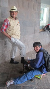 Jey getting a shoe shine in Cusco